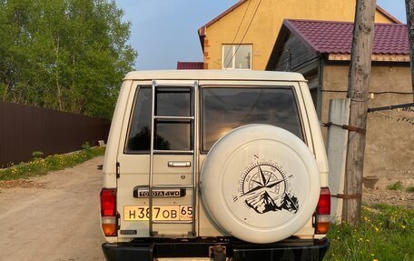 Toyota Land Cruiser 70, 1990 год, 1 000 000 рублей, 4 фотография