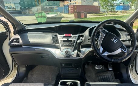 Honda Odyssey IV, 2011 год, 680 000 рублей, 24 фотография