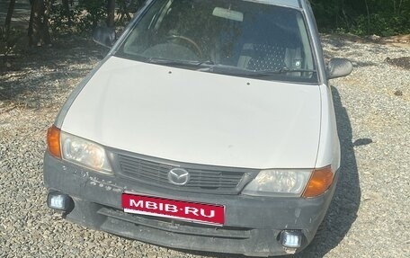 Mazda Familia Y11, 2000 год, 105 000 рублей, 1 фотография