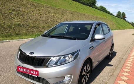 KIA Rio III рестайлинг, 2012 год, 827 000 рублей, 17 фотография