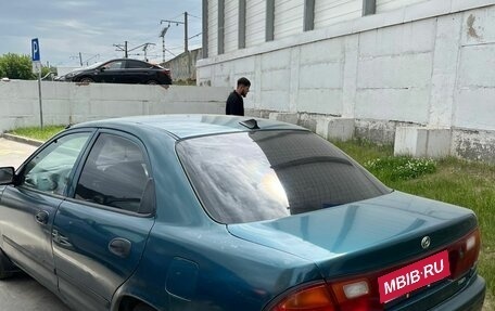 Mazda 323, 1997 год, 165 000 рублей, 3 фотография