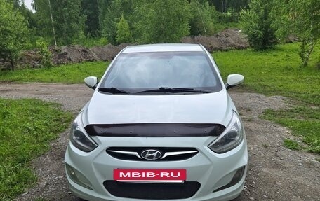Hyundai Solaris II рестайлинг, 2013 год, 760 000 рублей, 3 фотография