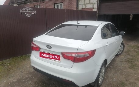 KIA Rio III рестайлинг, 2013 год, 750 000 рублей, 14 фотография