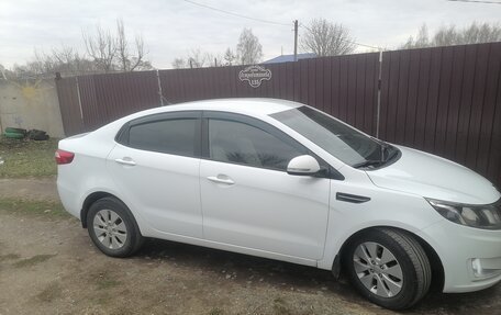 KIA Rio III рестайлинг, 2013 год, 750 000 рублей, 16 фотография