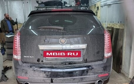 Cadillac SRX II рестайлинг, 2010 год, 810 000 рублей, 2 фотография