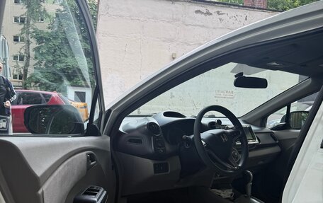 Honda Insight II рестайлинг, 2010 год, 676 000 рублей, 12 фотография