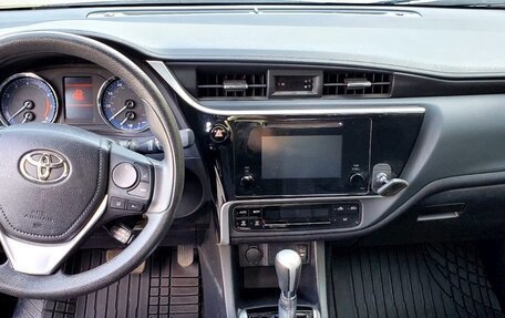 Toyota Corolla, 2017 год, 950 000 рублей, 7 фотография