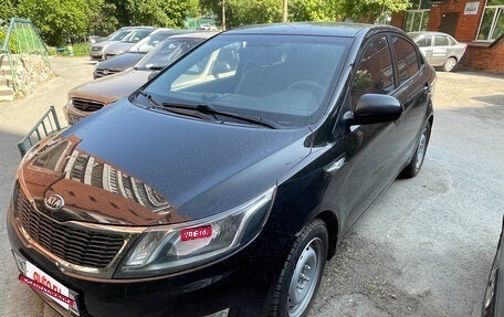 KIA Rio III рестайлинг, 2012 год, 870 000 рублей, 3 фотография