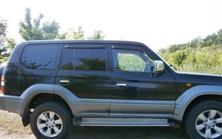 Toyota Land Cruiser Prado 90 рестайлинг, 1997 год, 920 000 рублей, 10 фотография