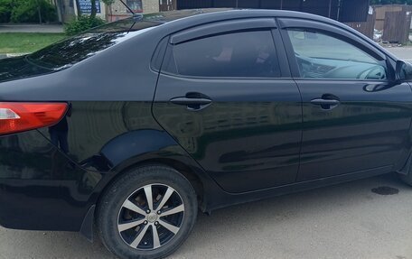 KIA Rio III рестайлинг, 2013 год, 680 000 рублей, 10 фотография