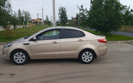 KIA Rio III рестайлинг, 2012 год, 750 000 рублей, 10 фотография