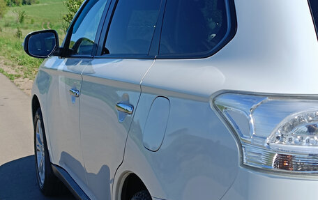 Mitsubishi Outlander III рестайлинг 3, 2013 год, 1 700 000 рублей, 5 фотография