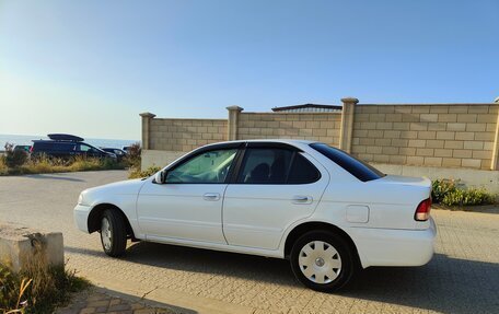 Nissan Sunny B15, 2003 год, 450 000 рублей, 3 фотография