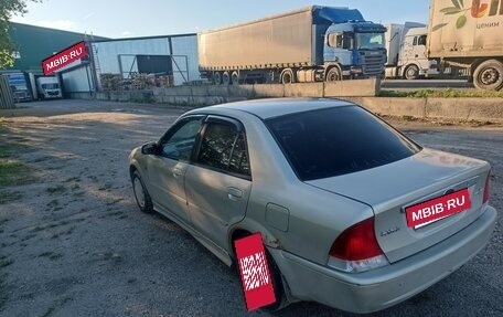 Ford Laser IV, 2003 год, 250 000 рублей, 5 фотография