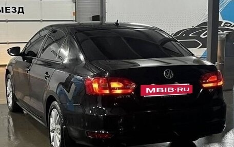 Volkswagen Jetta VI, 2011 год, 950 000 рублей, 3 фотография