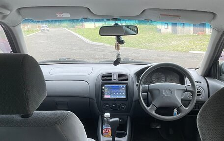 Mazda Familia, 1998 год, 450 000 рублей, 8 фотография