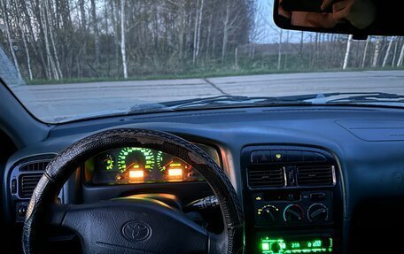 Toyota Avensis III рестайлинг, 1999 год, 300 000 рублей, 16 фотография