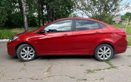 Hyundai Solaris II рестайлинг, 2012 год, 910 000 рублей, 3 фотография