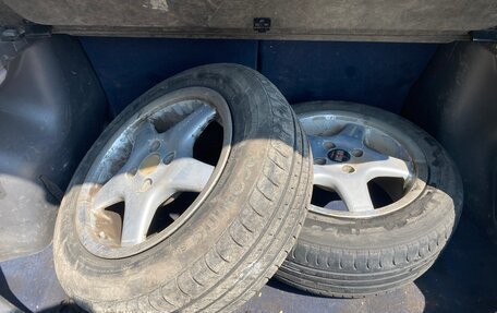 Mazda 323, 1999 год, 149 000 рублей, 12 фотография
