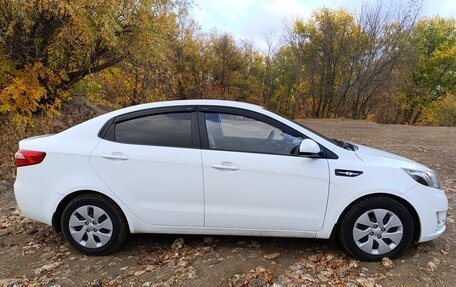 KIA Rio III рестайлинг, 2013 год, 850 000 рублей, 21 фотография