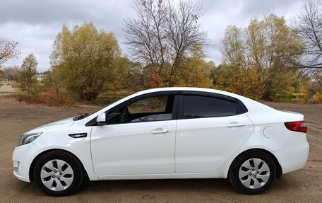 KIA Rio III рестайлинг, 2013 год, 850 000 рублей, 23 фотография