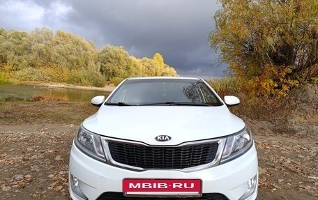 KIA Rio III рестайлинг, 2013 год, 850 000 рублей, 24 фотография