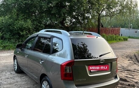 KIA Carens III (RP), 2011 год, 930 000 рублей, 3 фотография
