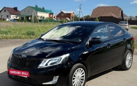 KIA Rio III рестайлинг, 2012 год, 6 фотография