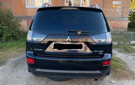 Mitsubishi Outlander III рестайлинг 3, 2008 год, 900 000 рублей, 14 фотография