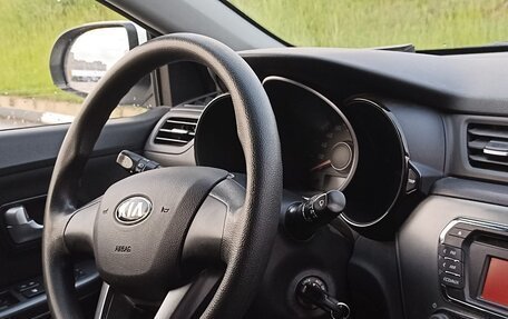 KIA Rio III рестайлинг, 2013 год, 890 000 рублей, 16 фотография
