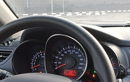 KIA Rio III рестайлинг, 2013 год, 890 000 рублей, 17 фотография