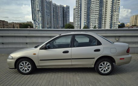 Mazda 323, 1998 год, 240 000 рублей, 4 фотография