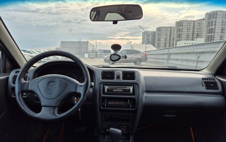 Mazda 323, 1998 год, 240 000 рублей, 7 фотография