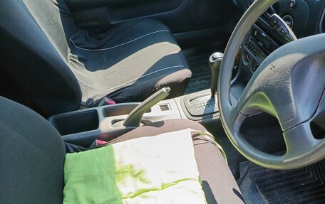 Mitsubishi Mirage VI рестайлинг, 1999 год, 199 000 рублей, 10 фотография