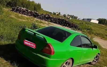 Mitsubishi Mirage VI рестайлинг, 1999 год, 199 000 рублей, 11 фотография