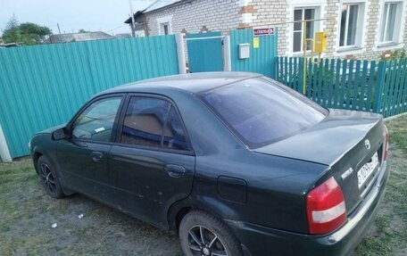 Mazda Familia, 1999 год, 250 000 рублей, 14 фотография