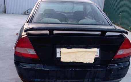 Mitsubishi Mirage VI рестайлинг, 2002 год, 160 000 рублей, 11 фотография