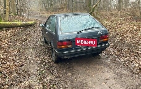 Mazda 323, 1987 год, 90 000 рублей, 10 фотография