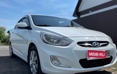 Hyundai Solaris II рестайлинг, 2011 год, 730 000 рублей, 5 фотография