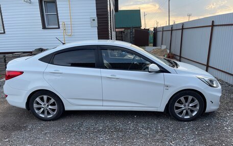 Hyundai Solaris II рестайлинг, 2011 год, 730 000 рублей, 14 фотография
