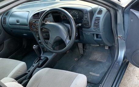 Mitsubishi Mirage VI рестайлинг, 1997 год, 200 000 рублей, 8 фотография