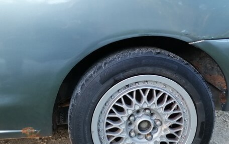 Mitsubishi Mirage VI рестайлинг, 1997 год, 200 000 рублей, 11 фотография