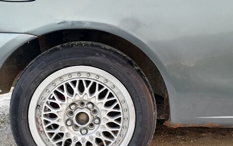 Mitsubishi Mirage VI рестайлинг, 1997 год, 200 000 рублей, 14 фотография