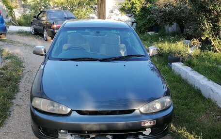 Mitsubishi Mirage VI рестайлинг, 1997 год, 200 000 рублей, 20 фотография