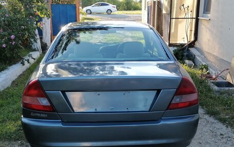 Mitsubishi Mirage VI рестайлинг, 1997 год, 200 000 рублей, 16 фотография