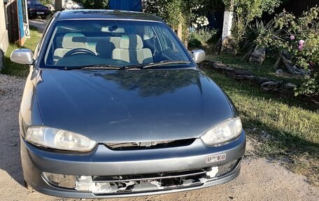 Mitsubishi Mirage VI рестайлинг, 1997 год, 200 000 рублей, 23 фотография