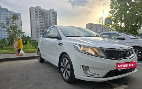KIA Rio III рестайлинг, 2014 год, 1 075 000 рублей, 21 фотография