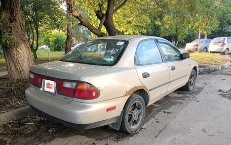 Mazda 323, 1998 год, 150 000 рублей, 2 фотография