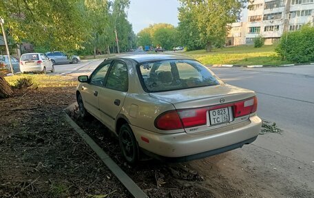 Mazda 323, 1998 год, 150 000 рублей, 3 фотография