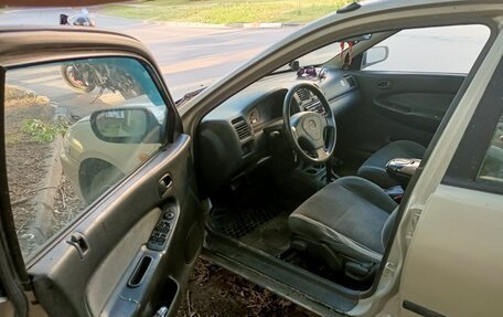 Mazda 323, 1998 год, 150 000 рублей, 7 фотография